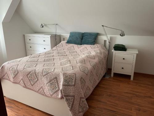 Ένα ή περισσότερα κρεβάτια σε δωμάτιο στο Dom Relaks & Wypoczynek