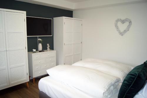 Cama ou camas em um quarto em Winterberg Appartement 21116