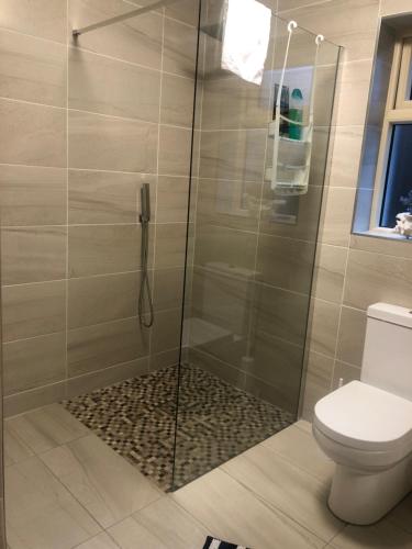 Ein Badezimmer in der Unterkunft MapleHouse B&B