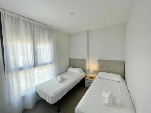 Postel nebo postele na pokoji v ubytování Flat Infinium 15th Floor