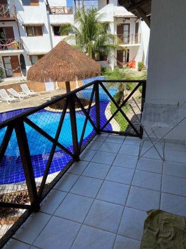 Πισίνα στο ή κοντά στο Apartamento Recanto dos Golfinhos Pipa RN
