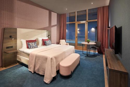 Postel nebo postele na pokoji v ubytování Van der Valk Hotel Haarlem