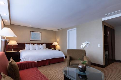 Ένα ή περισσότερα κρεβάτια σε δωμάτιο στο Eurobuilding Hotel & Suites Caracas