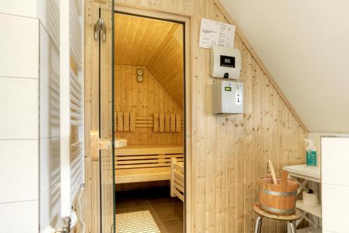 a room with a sauna inside of a house at Haus Windflüchter in Zingst