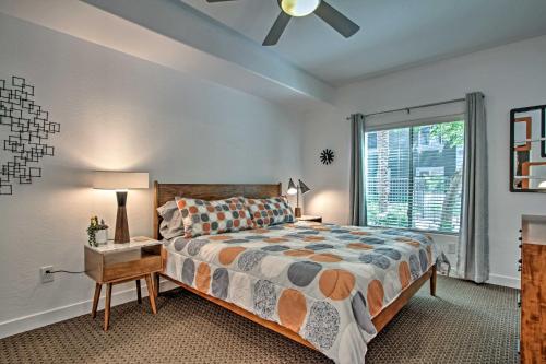 a bedroom with a bed and a window at Mid-Century Modern Phoenix Condo, Walk to High St! in Phoenix