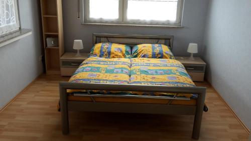 Кровать или кровати в номере Ferienwohnung Braun