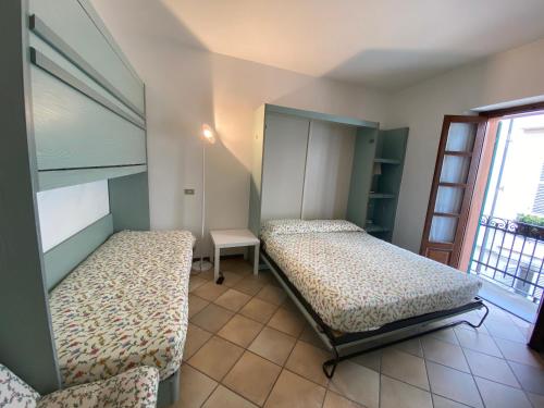 Cama o camas de una habitación en CANNON d'ORO