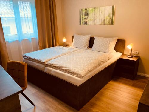 Ένα ή περισσότερα κρεβάτια σε δωμάτιο στο Ferienhaus Hinz