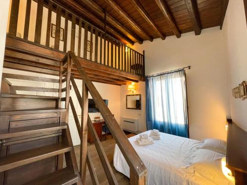 Postel nebo postele na pokoji v ubytování Hotel La Plumeria