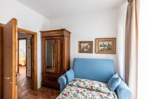 Ένα ή περισσότερα κρεβάτια σε δωμάτιο στο La Locanda di Adele - Il Giardinetto B&B