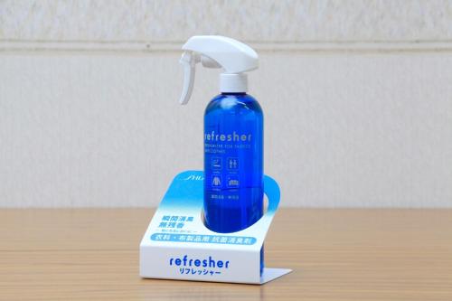 a blue mouthwash bottle sitting on top of a box at Sendai Business Hotel Ekimae - Vacation STAY 71918v in Sendai