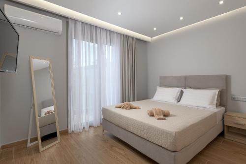 Postel nebo postele na pokoji v ubytování Villa Costa