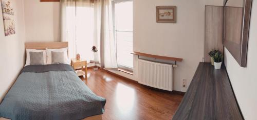Postel nebo postele na pokoji v ubytování Apartament Beskidzki Relax