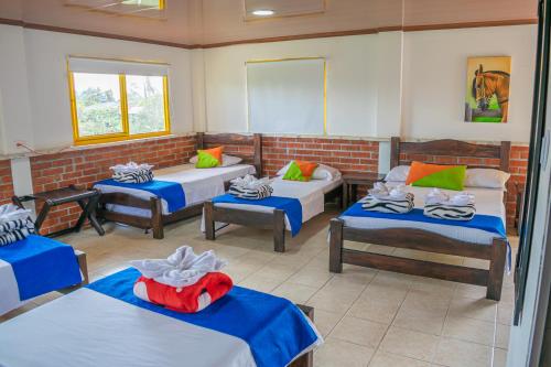 Finca Hotel San Isidroにあるベッド