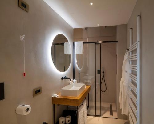 a bathroom with a sink and a shower at Masseria Corsano in Nardò