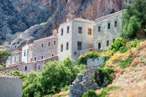 a building on the side of a mountain at Malvasia Traditional Hotel in Monemvasia