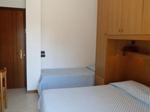 Postel nebo postele na pokoji v ubytování Hotel Acapulco