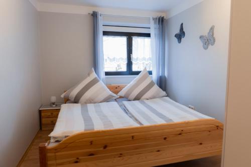 Postel nebo postele na pokoji v ubytování Ferienwohnung Schießl