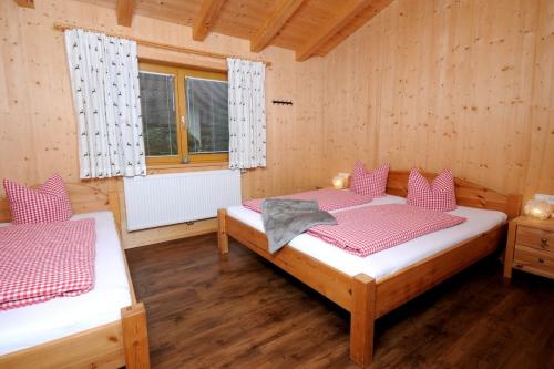 Katil atau katil-katil dalam bilik di Maries Ferienhaus MAY-100