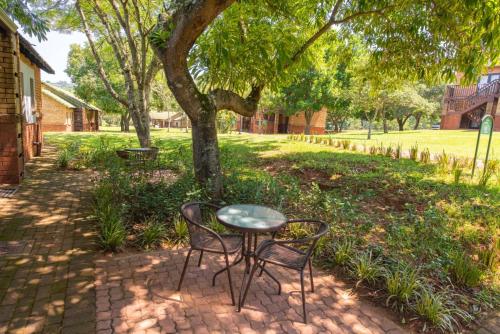 Ein Garten an der Unterkunft Thyme Inn on Greenway