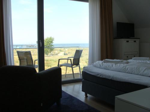 Zdjęcie z galerii obiektu Ostsee - Reetdachhaus Nr 34 "Caelestis" im Strand Resort w mieście Heiligenhafen