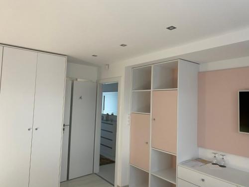 Televisyen dan/atau pusat hiburan di Amira Apartman & Wellness