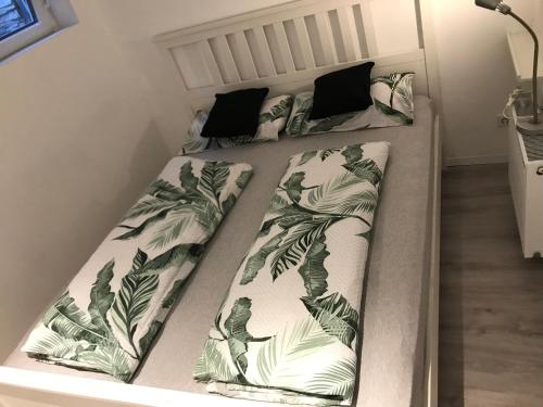 Ένα ή περισσότερα κρεβάτια σε δωμάτιο στο Apartment St Mauritz Souterrain