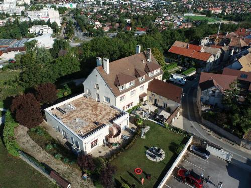 an aerial view of a large white house at La Bonbonniere - Sure Hotel Collection by Best Western in Talant