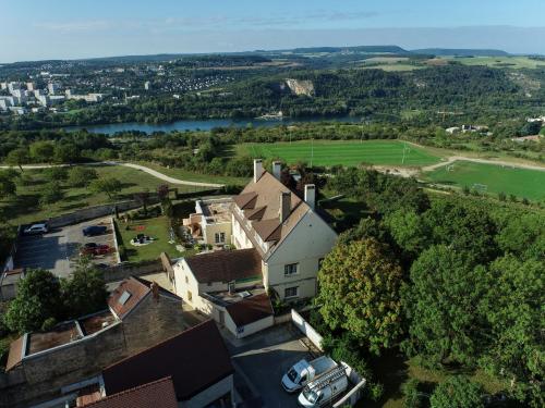 an aerial view of a large house with a yard at La Bonbonniere - Sure Hotel Collection by Best Western in Talant