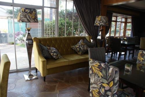 Χώρος καθιστικού στο Lindekroon Guest House
