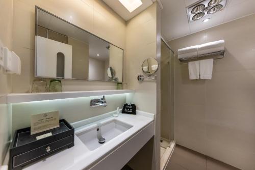 Ванная комната в Starr Hotel Shanghai (Shanghai Railway Station)