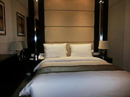 Cama o camas de una habitación en Serela Waringin by KAGUM Hotels