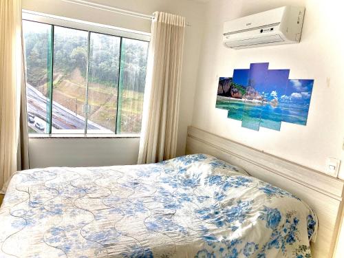 Internacional Residence c linda vista Beira Mar tesisinde bir odada yatak veya yataklar