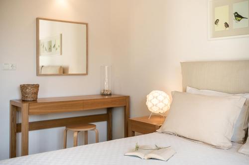 Postel nebo postele na pokoji v ubytování Myrtia Beach House