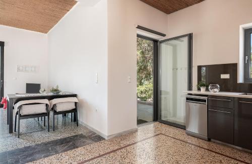 Kuchyň nebo kuchyňský kout v ubytování Myrtia Beach House