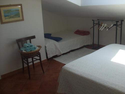 Postel nebo postele na pokoji v ubytování B&B L'Umbra di lu Soli
