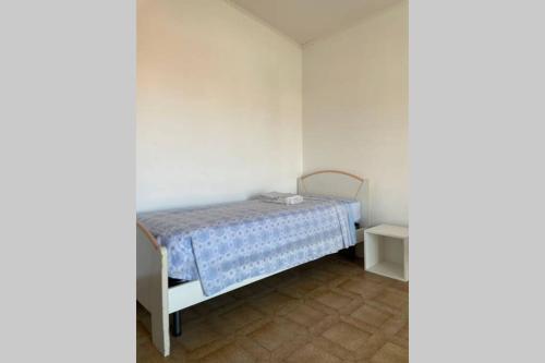A bed or beds in a room at Villa Anna Paola