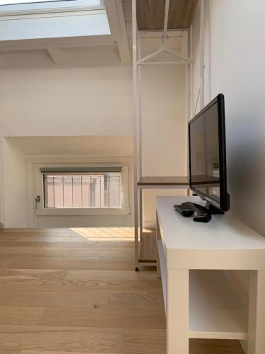 Una televisión o centro de entretenimiento en Residenze Mazzini