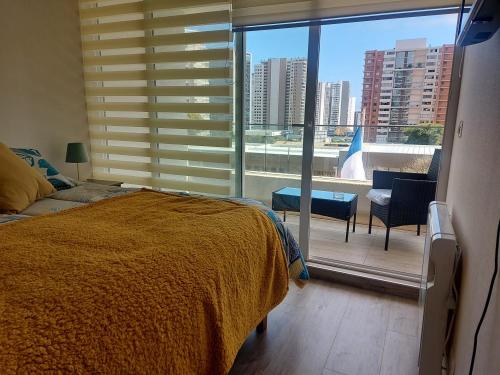 Posteľ alebo postele v izbe v ubytovaní Edificio Medano Con Con