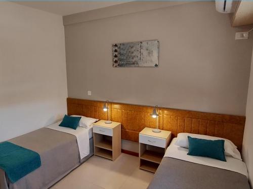 Кровать или кровати в номере Rialto Venezia Hotel