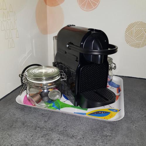 a coffee maker sitting on a tray on a counter at Silo 161 in Ruinerwold