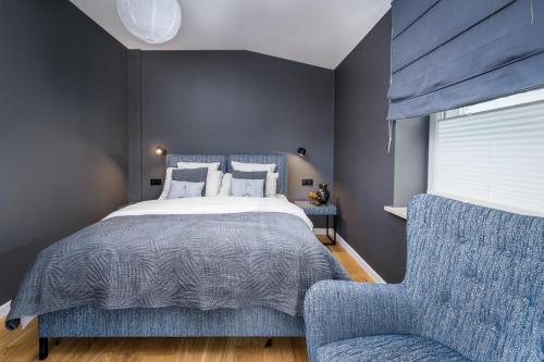 Postel nebo postele na pokoji v ubytování Boutique Hotel RABBIT HOLE
