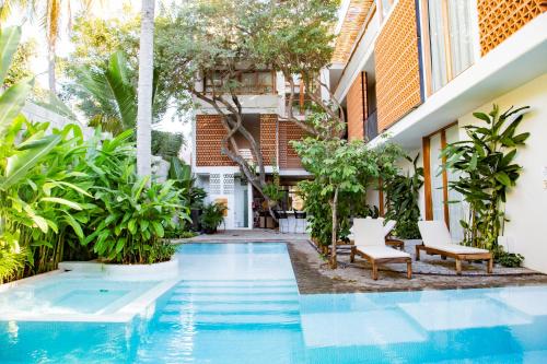 Agua de Luna Hotel Boutique, San Pancho Nayaritの敷地内または近くにあるプール