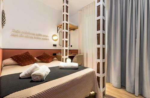 Кровать или кровати в номере Cálamo Guesthouse
