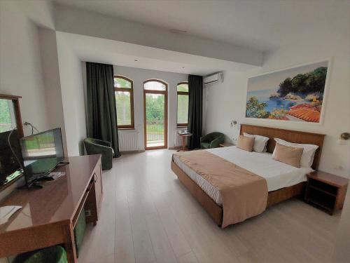 Postel nebo postele na pokoji v ubytování Hotel Insula