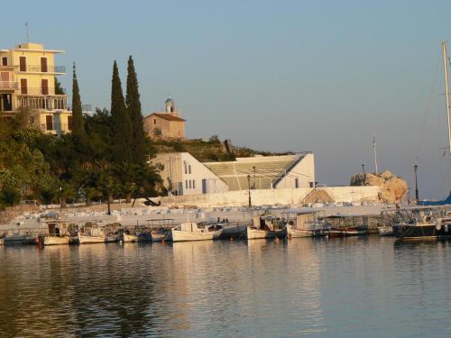 a group of boats are docked in a harbor at 85 sqm Apartments New Panorama ELECTRIC CAR ΦΩΡΤΗΣΗΣ STATION in Paralion astros