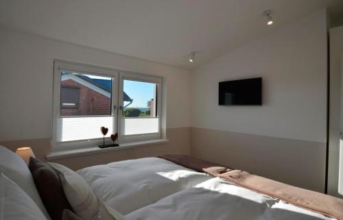 KronsgaardにあるÆrøのベッドルーム(ベッド1台、窓付)