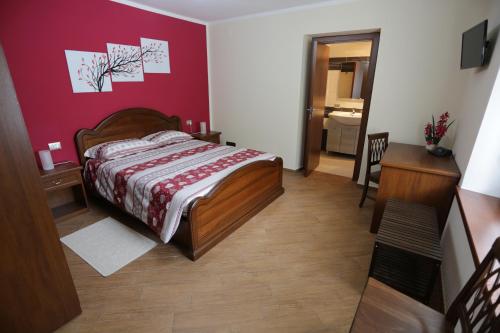 Una cama o camas en una habitación de Mandoué