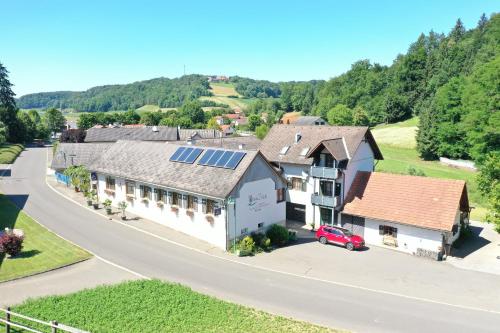 an overhead view of a house with solar panels on it at Gasthof Zum Wallner in Kalch
