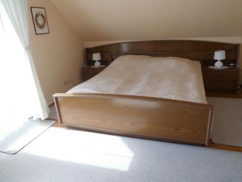 Postel nebo postele na pokoji v ubytování Haus Renate in Neukirchen